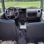 1991_raymond-ms-seated